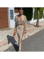 Isolde | Women's Wedding Guest Dress With Deep V-Neckline And Twisted Waist Detail