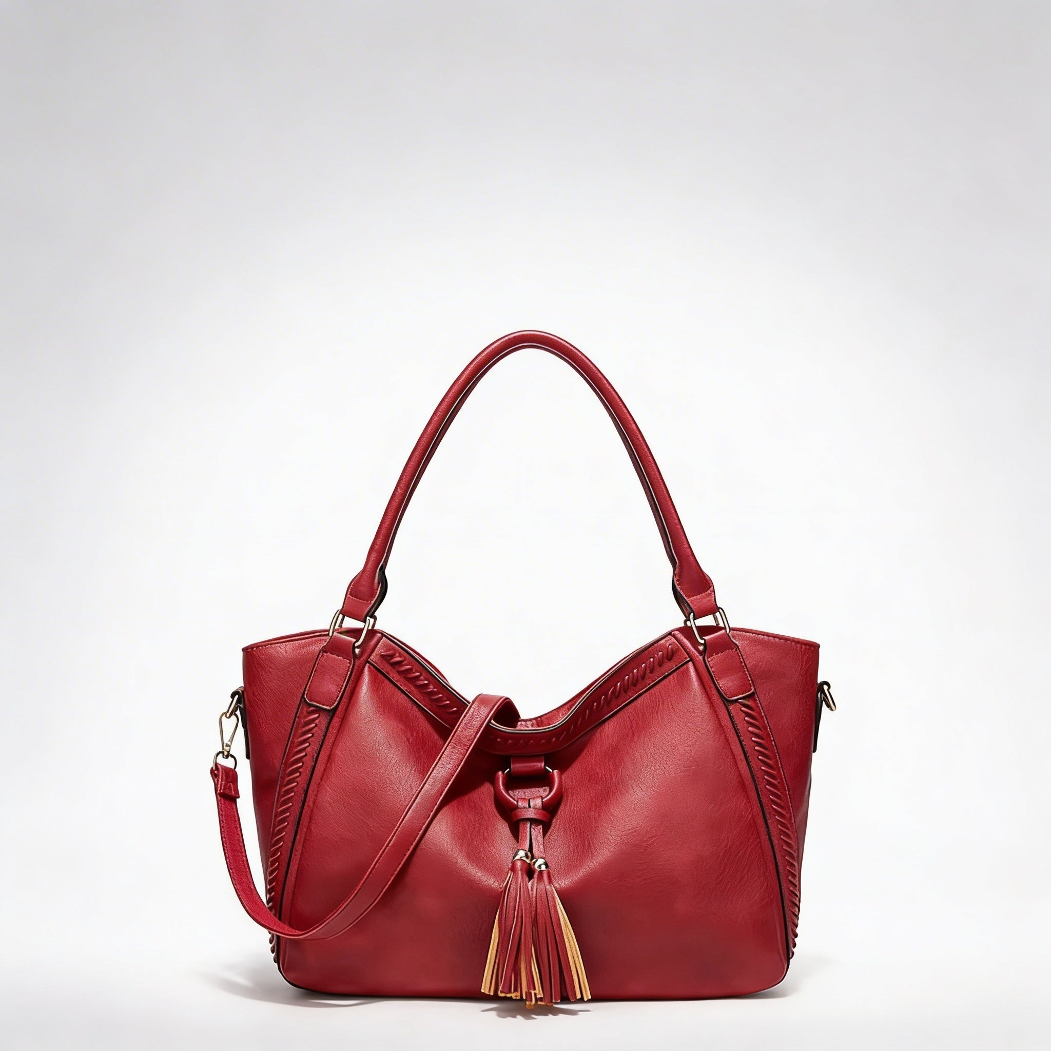 Vera | Women’s Crossbody Bag With Tassel Accent And Bold Stitch Detailing | Modern