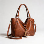 Vera | Women’s Crossbody Bag With Tassel Accent And Bold Stitch Detailing | Modern